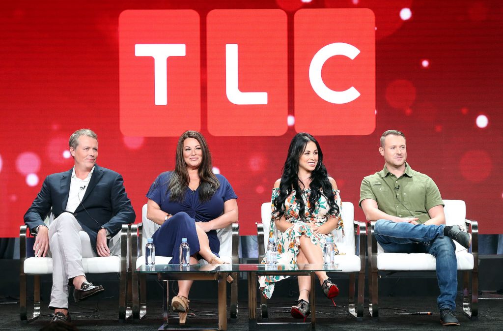 90 Day Fiance panel in front of a TLC logo