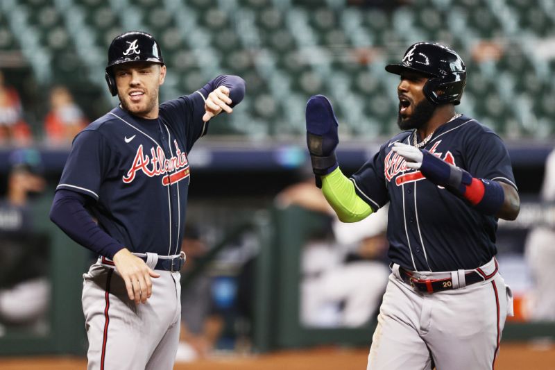 For the first time since 2001, Braves joined NLCS after clearing Marlins.  (Photo by Elsa / Getty Images)