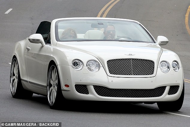 Ride in style: Following their meal, the A-List couple entered and exited in their white Bentley