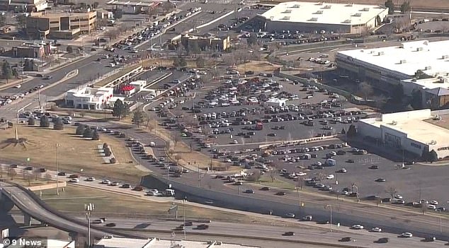 The huge lines leading to Aurora's in-n-out location and traffic are shown from the sky