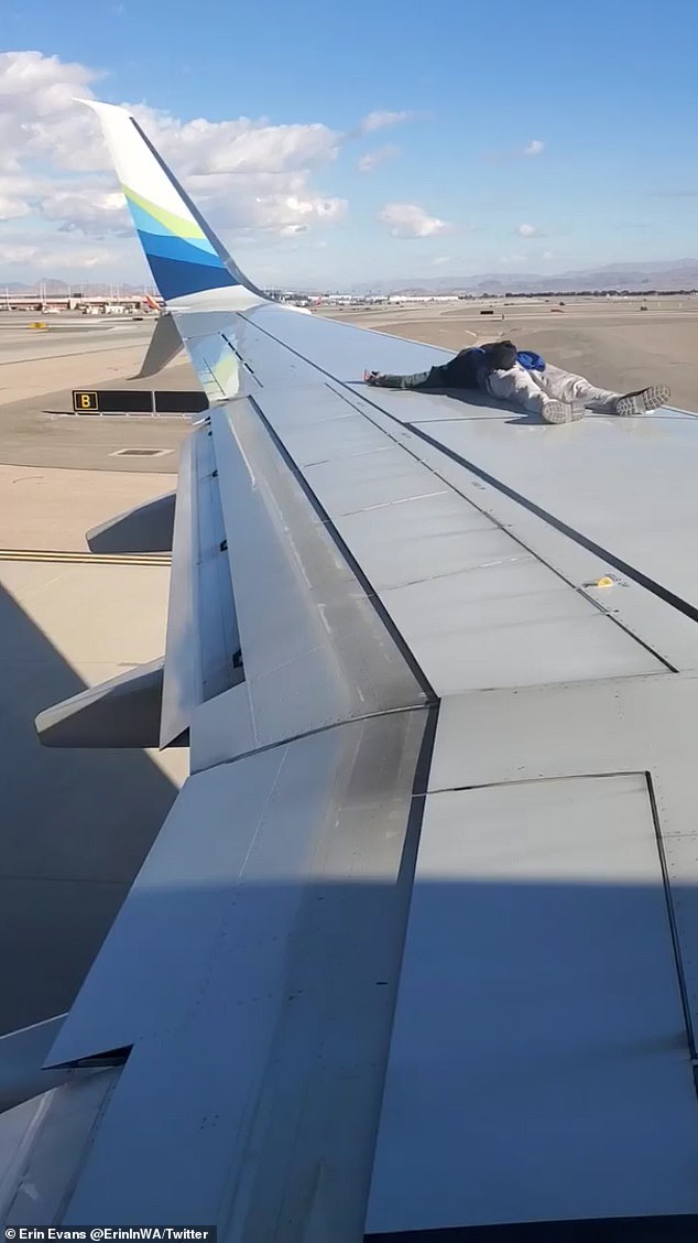 At one point, the man decided to lie down on the wing of the plane he was sitting on