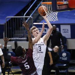 BYU center Matt Harmes (3) puts a shot on Texas South forward Jordan Carl Nichols (5) during the Cookers' 87-71 victory at the Marriott Center in Provo on Monday 21 December 2020.