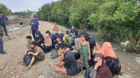 Dozens of refugees stranded at sea to be isolated on disputed island 