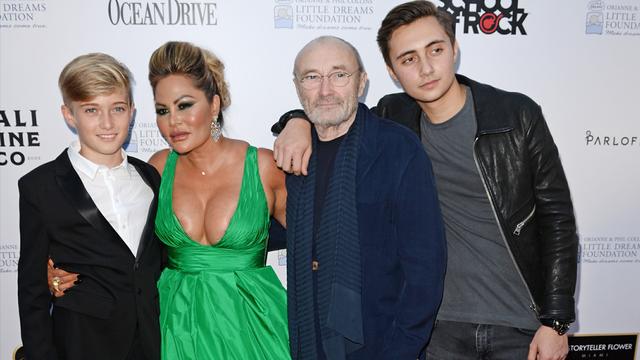 Phil Collins with son Nicholas on right and son Matthew and ex-wife Orianne Cevey on left.
