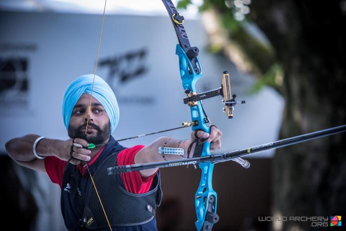 Indian archer shoots his bow