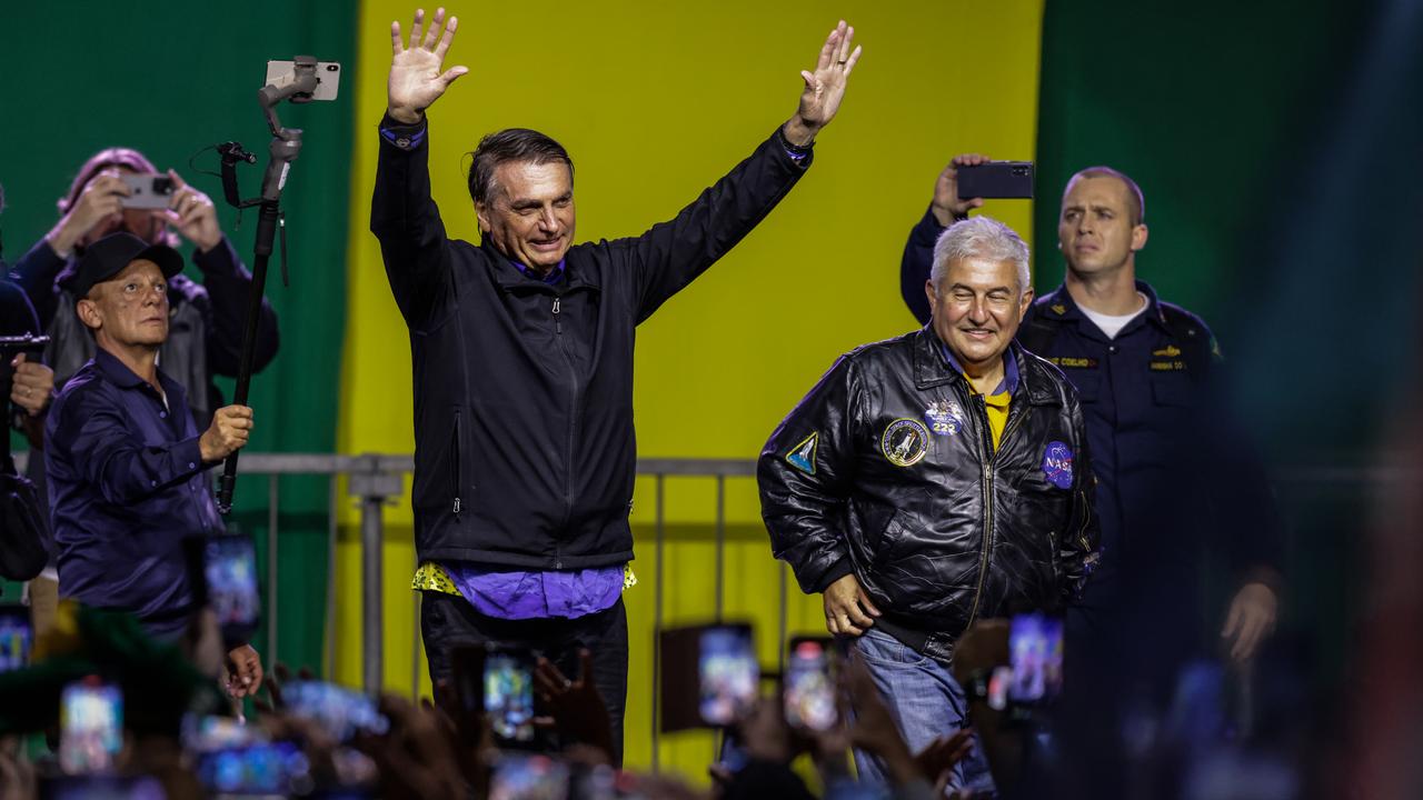 Incumbent President Jair Bolsonaro receives applause at a rally ahead of the election.