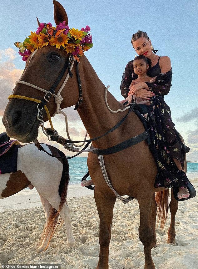Yee-ha: Klose took his baby girl to a mother / daughter sunset horseback ride through the sand.