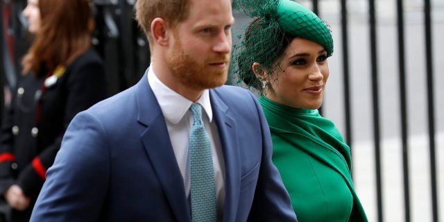 Prince Harry (left) and Megan Markle (right) announced earlier this year that they were stepping down from their royal duties.  They then traveled with their 1-year-old son Archie to Santa Barbara, California to sign a production contract with Netflix.  (AP photo / Kirsty Wigglesworth, file)