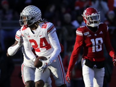 File - In this November 16, 2019 file photo, Ohio State Cornerback Shawn Wade (24) reacts after interrupting the first half of the game against the Ruggers at Biscay, NJ (AP Photo / Adam Hunger, file)