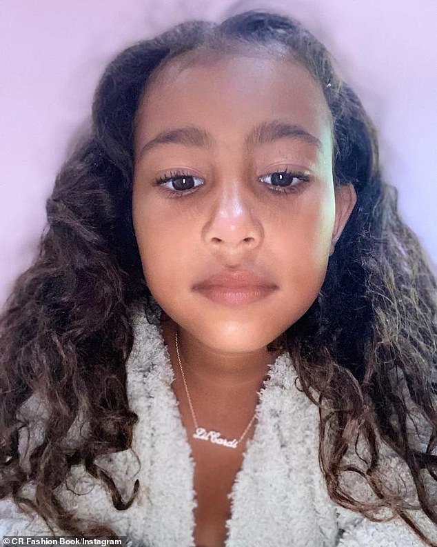 North West, 7, Lil Cardi necklace with rocks and CV.
