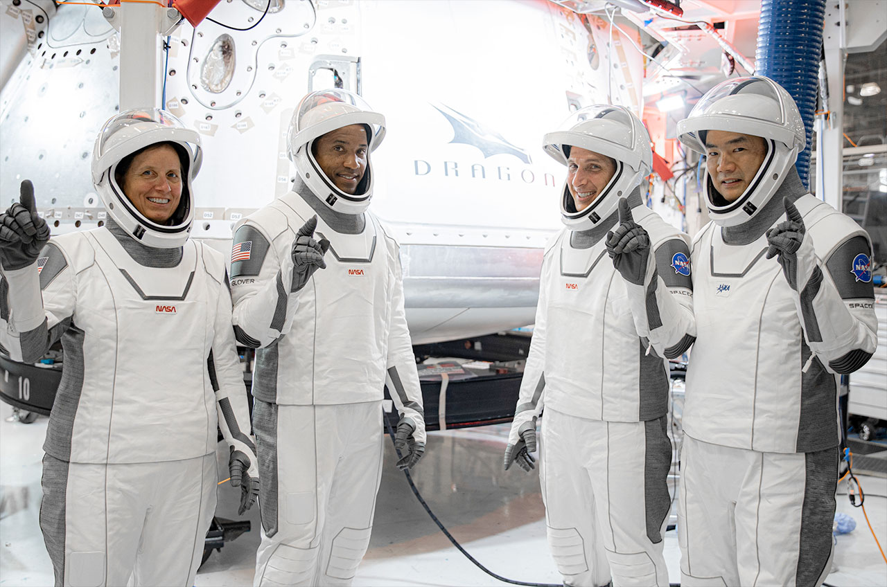 SpaceX's Crew-1 astronauts pose in front of their Dragon capsule, including NASA astronauts Shannon Walker, Victor Clover and Michael Hopkins, and Jaxa astronaut Sochi Nokuchi. "விரிதிறன்," Headquartered at SpaceX in Hawthorne, California.
