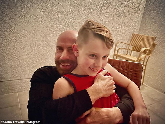 Family: A few days before the holiday, John celebrated their son Benjamin's 10th birthday with a sweet photo posted online.