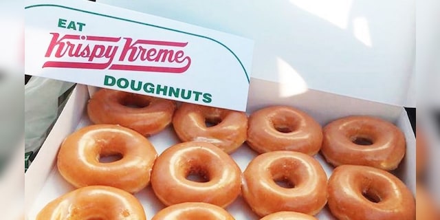 Crispy Cream offers a dozen donuts for just $ 1 by purchasing another dozen donuts on Saturday.  (Crispy Cream)