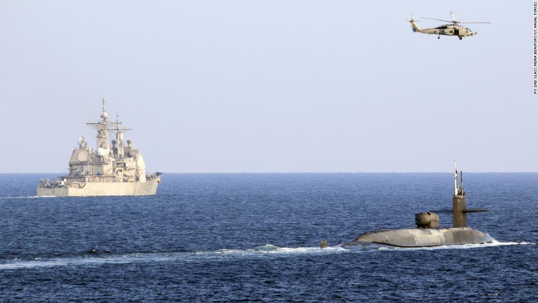 The U.S. Navy sails across the Strait of Hormuz on a nuclear submarine