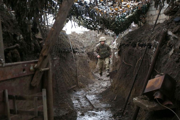 A peaceful moment in the trenches in the front line of the Ukrainian army Korlyvka with Russian-backed separatists in the Donetsk region.  Image AFP