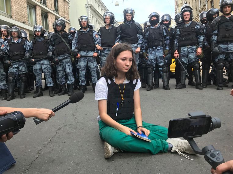July 27, 2019. Olga Misik in Moscow in front of an army riot police.  AP Image