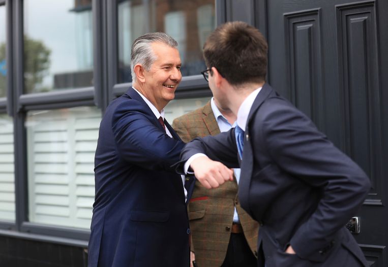 Edwin Poots (left) is fiercely against homosexuality and abortion.  AP Image