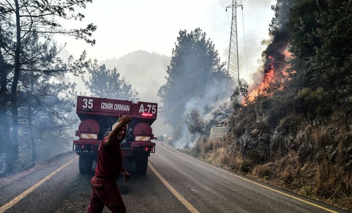 Firefighters at work near Bodrum in Muğla province.
