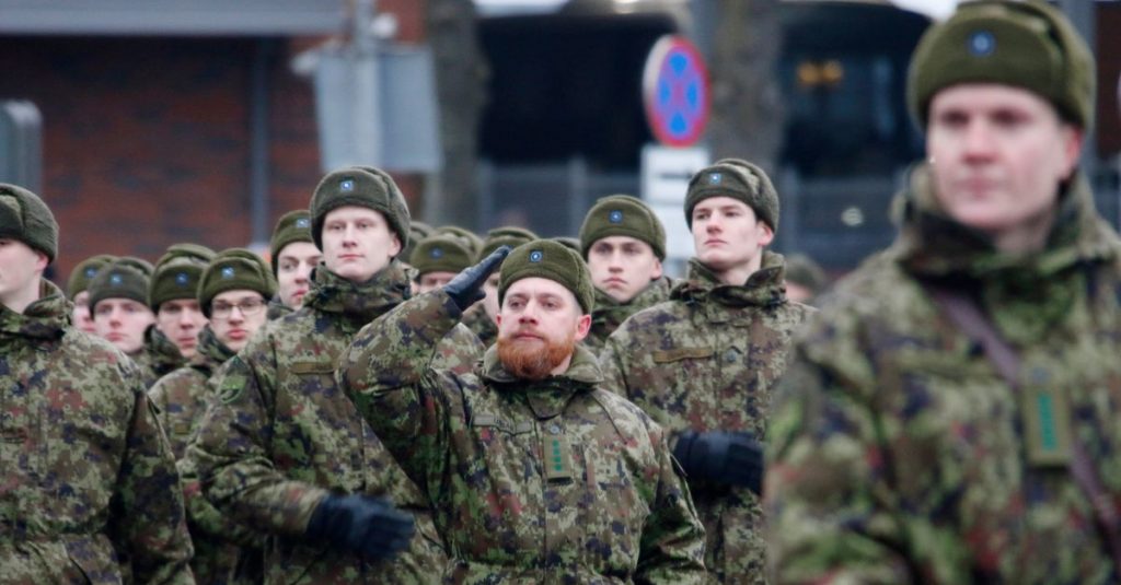 Estonia calls in reservists, places barbed wire along Russian border