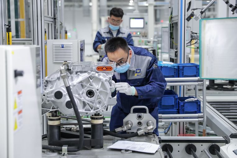 He works at a Volkswagen factory in Tianjin, China.  Picture cartridge 
