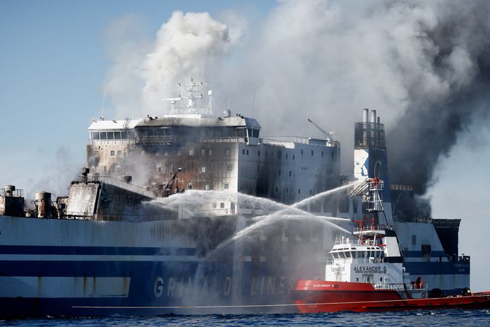 Firefighters control the fire on the ferry