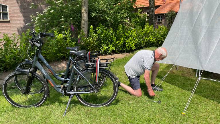 Wiegert sets up the tent