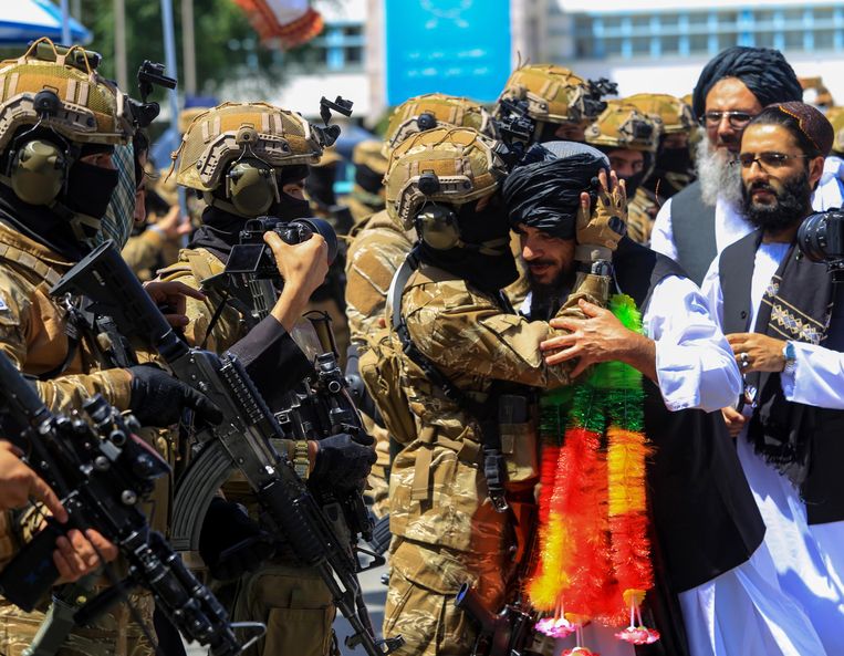 Guantanamo Bay detainee Harun Gul is hugged by Taliban members upon his release on Saturday upon arriving in the Afghan capital, Kabul.  ANP/EPA picture