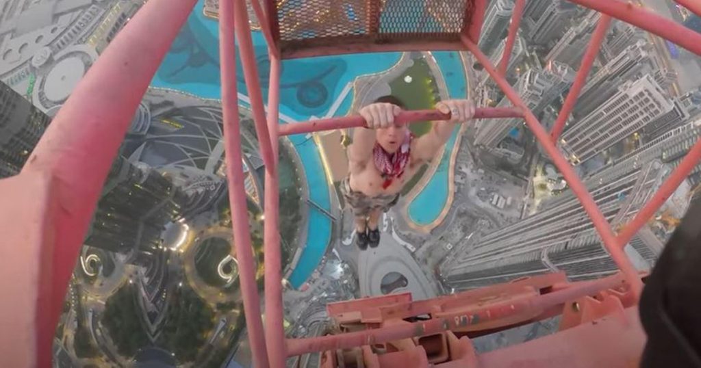 British daredevil does stunts and hangs from Dubai's tallest crane unsafely |  Abroad