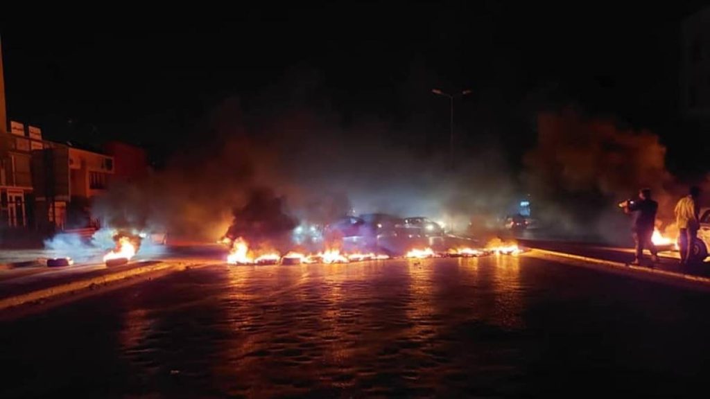 Protesters storm the Libyan parliament building and set it on fire
