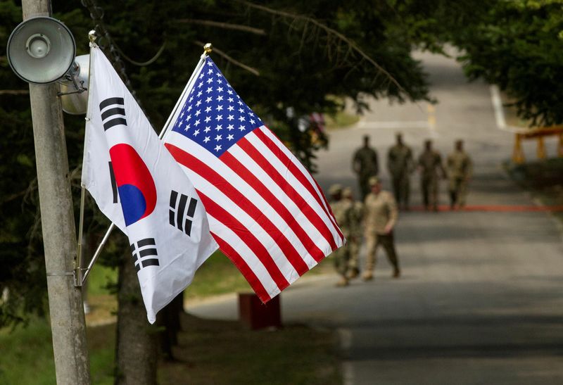 FILE PHOTO: American and South Korean flags at Yongin South Korea