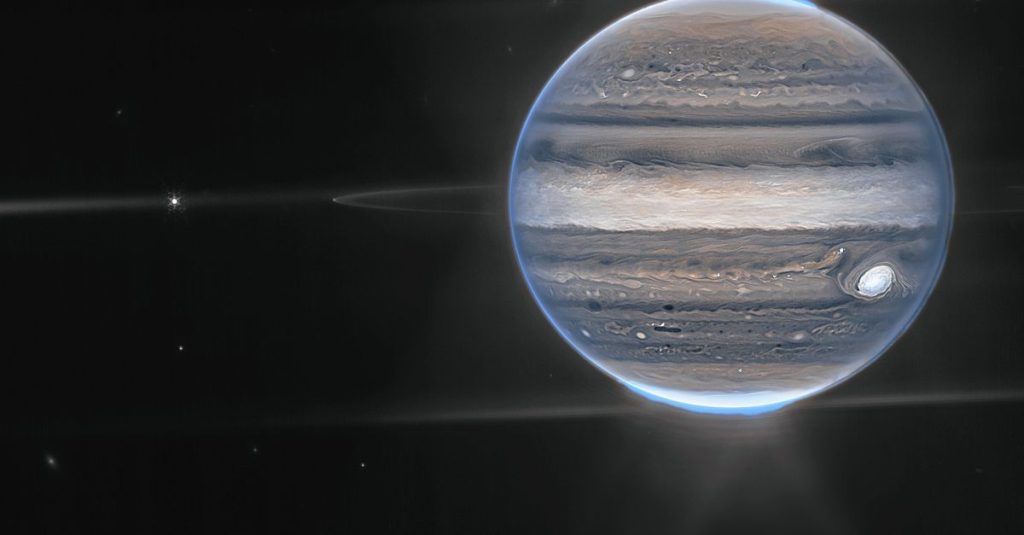 Aurora borealis and rings on a detailed photo of Jupiter