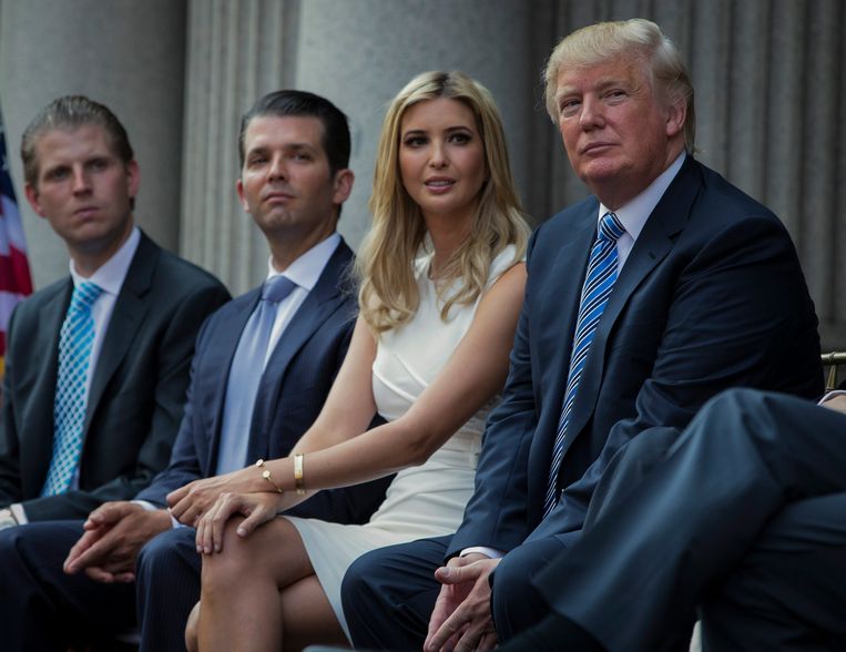 Donald Trump (right) with his children (left to right) Eric, Donald Jr and Ivanka.  All four were charged with fraud and fraud.  Image access point
