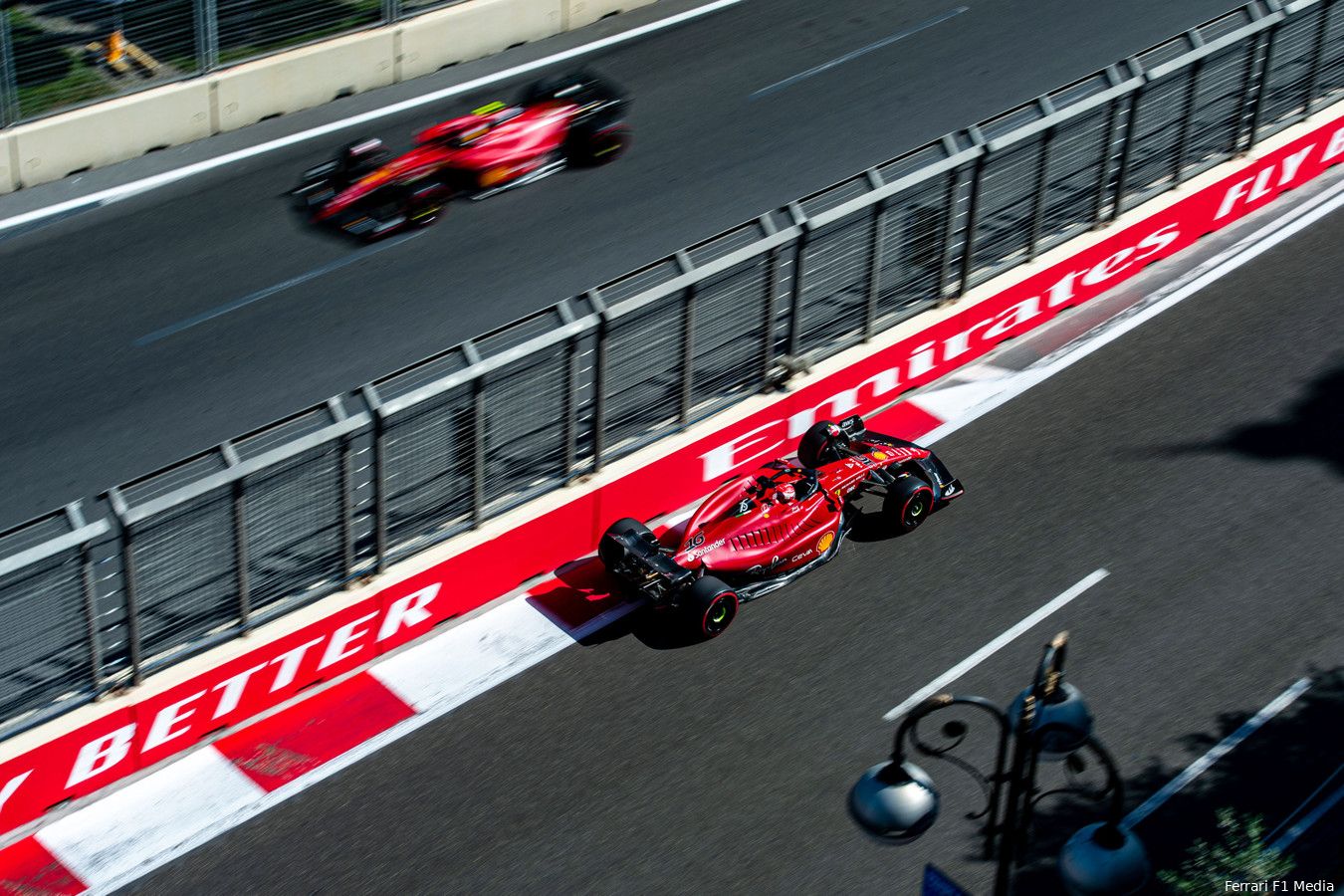 The two Ferraris race through the streets of Azerbaijan.  Carlos Sainz retired with hydraulic problems in the opening phase, and when Charles Leclerc then entered the pit lane with a crashed engine, the dramatic weekend for Ferrari was over.  (Photo: Ferrari F1 Media)