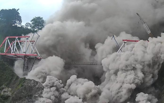 A bridge not far from the Semuru volcano was damaged by ash clouds.