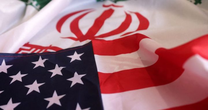 FILE PHOTO: Illustration shows USA and Iranian flags